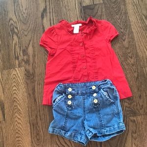 Red button shirt with blue Jean shorts